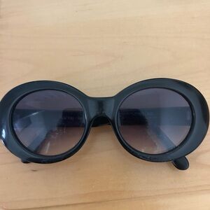 Emmanuelle Khanh black oval sunglasses